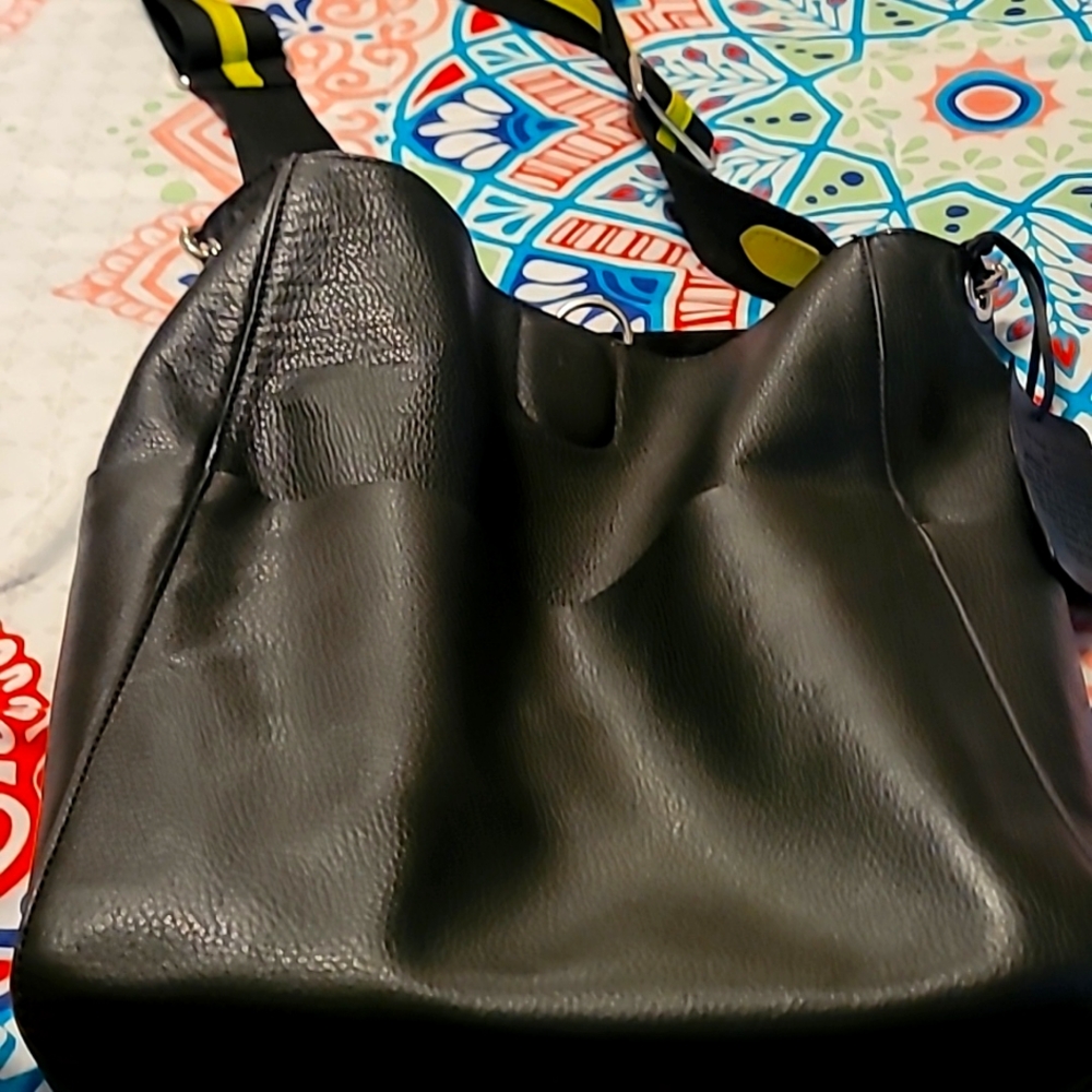 Gorgeous Black Italian leather crossbody or hobo handbag with all leather.
